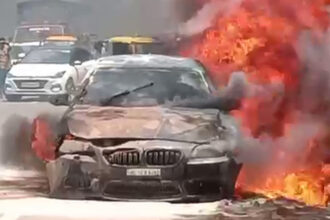 BMW car caught fire in the middle of the highway