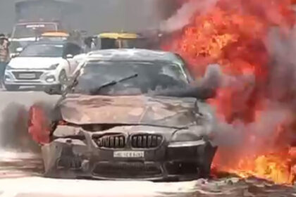 BMW car caught fire in the middle of the highway