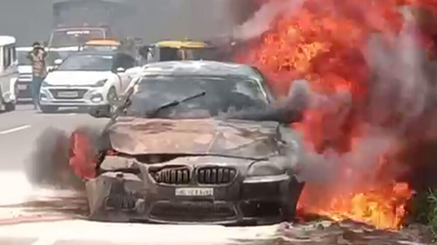 BMW car caught fire in the middle of the highway