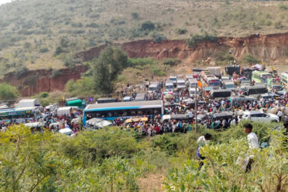 Vehicles parked on the road, traffic police missing
