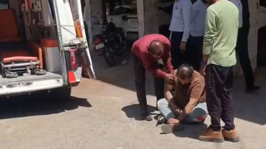 Drunk professor wandering in the middle of the road